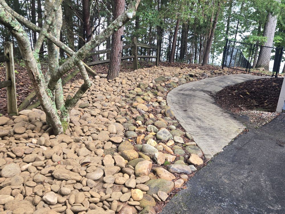 Enhance your outdoor living space with our expert patio design & construction services. We craft beautiful and functional patios that perfectly complement your home’s landscape for ultimate relaxation and enjoyment. for Lafollette Mulch, Stone and Lawn Care in La Follette, TN