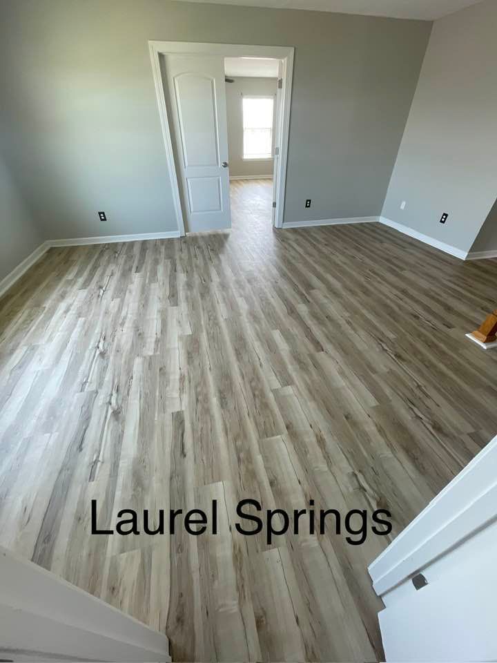 Our LVP service offers homeowners durable, stylish, and cost-effective luxury vinyl planks that mimic natural wood or stone. Easy to install and maintain, we enhance any room with elegance and functionality. for Triad Flooring & Construction in Trinity, NC