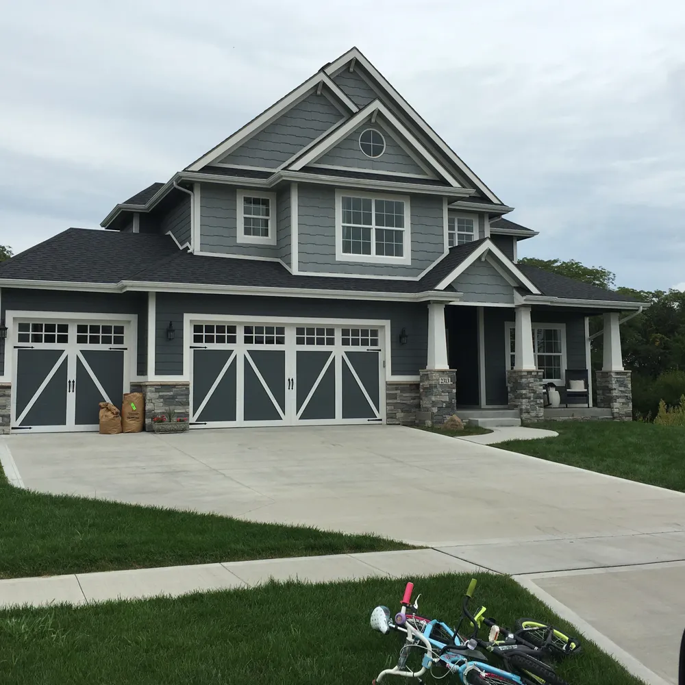 Genesis Roofing & Construction team in Cumming, IA - people or person