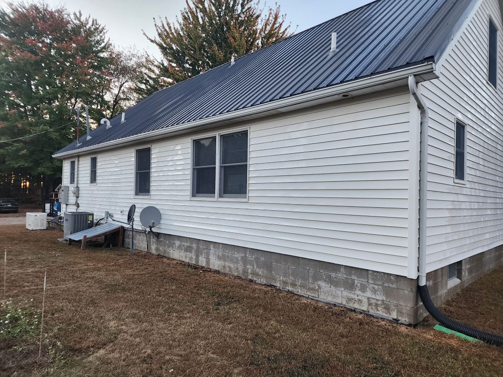 Enhance your home's safety and aesthetic with our expert gutter cleaning service, which efficiently removes debris to prevent water damage and ensure smooth drainage, complementing our pressure washing expertise. for D & E Power Washing in Mt Pleasanr, MI