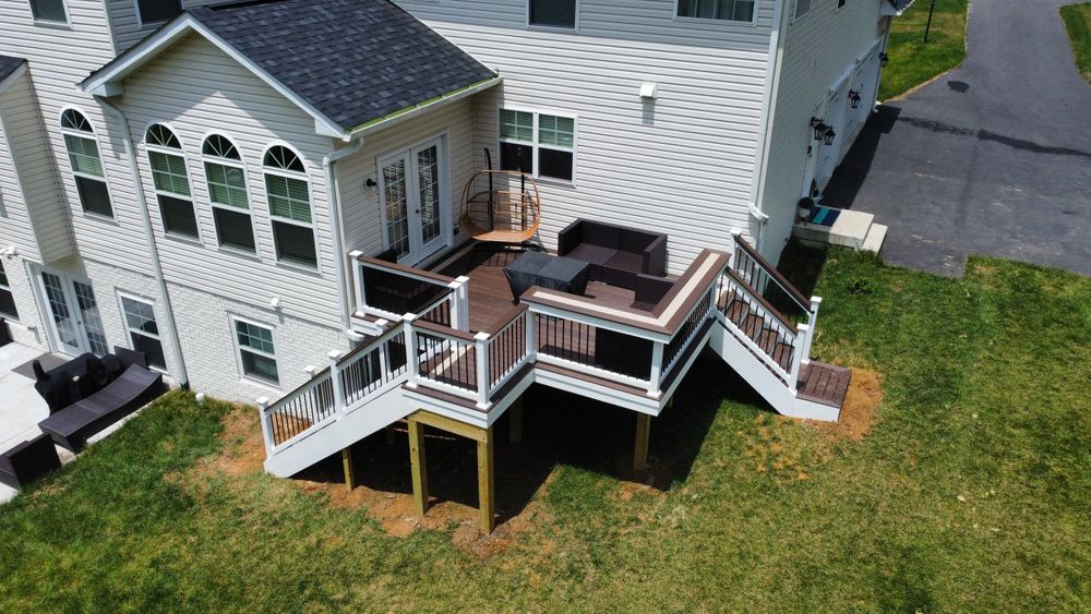 Our deck building service offers homeowners the opportunity to enhance their outdoor living space with custom-designed decks that seamlessly blend functionality and aesthetics. for Keyes Exteriors in Stafford, VA