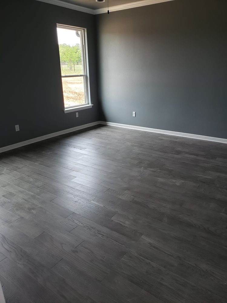 Our Flooring service offers a wide range of high-quality materials and expert installation to enhance the aesthetics and functionality of your home, transforming it into a stylish and comfortable space. for Top Hand Construction in Azle,  TX