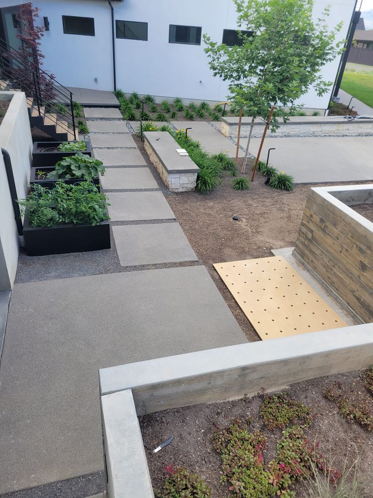 Our Maintaining & Resealing service ensures long-lasting protection by applying roof seal, preserving your concrete surfaces from weather damage and wear while enhancing their appearance and extending their lifespan. for Artisan Concrete in Bluffdale, UT