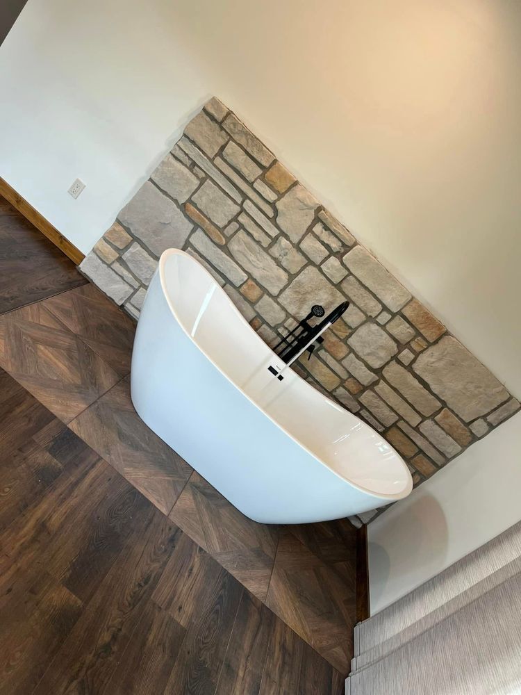 Transform your bathroom with our expert tiling services. We provide precision installation, durable materials, and a wide variety of styles to elevate your space and ensure long-lasting beauty and functionality. for Toni the Plumber LLC in North Olmsted, OH