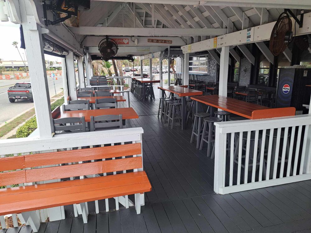 Enhance your deck's durability and appearance with our expert deck coating stains. We provide long-lasting protection against weathering while highlighting the natural beauty of your outdoor space. for Red Knight Painting in Daytona Beach, FL