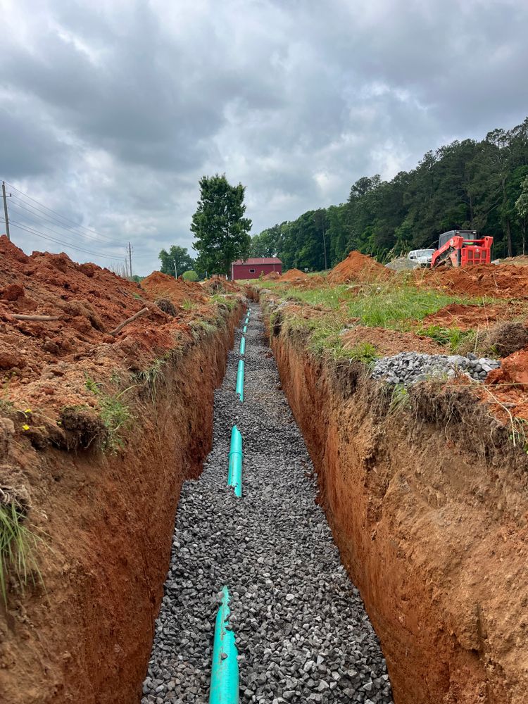 Our Sewer & Water Lines service ensures reliable, efficient installation and repair of essential underground systems, safeguarding your home with expert attention to detail and cutting-edge equipment for optimal performance and peace of mind. for J.P Landscaping and excavation in Chattanooga, TN