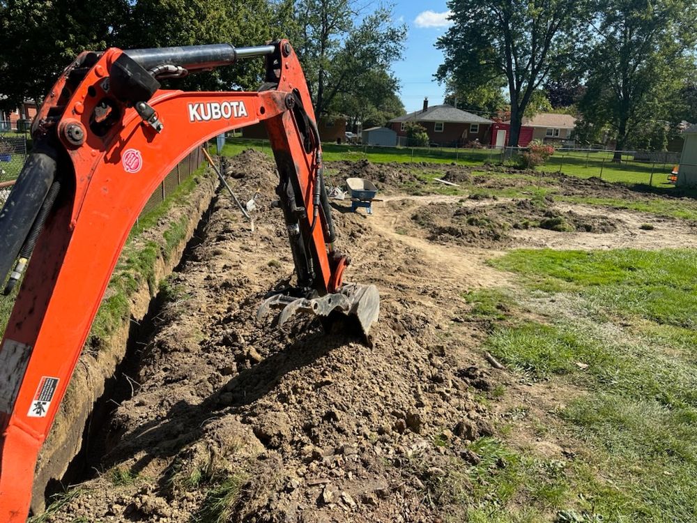 Our French Drains and Drainage Systems service helps prevent water accumulation in your yard, keeping it free from excessive moisture and maintaining a healthy lawn. for Hauser's Complete Care INC in Lancaster, NY