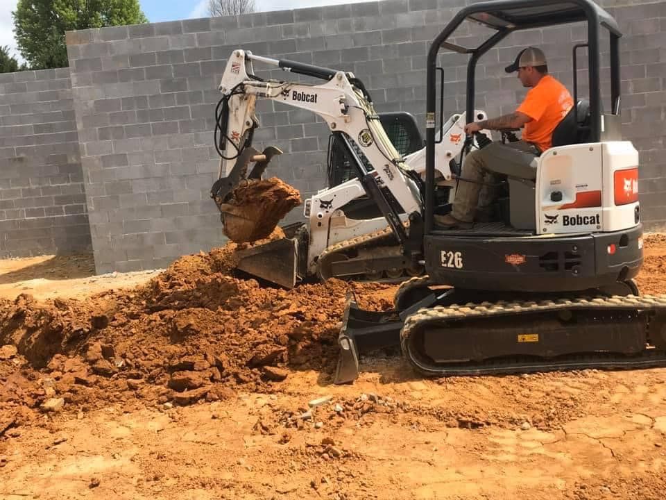 Our Residential & Commercial Excavation service provides expert land clearing, trenching, grading, and site preparation to ensure your project is completed efficiently and effectively. Contact us for a quote today! for KTN Excavation in Clinton, TN