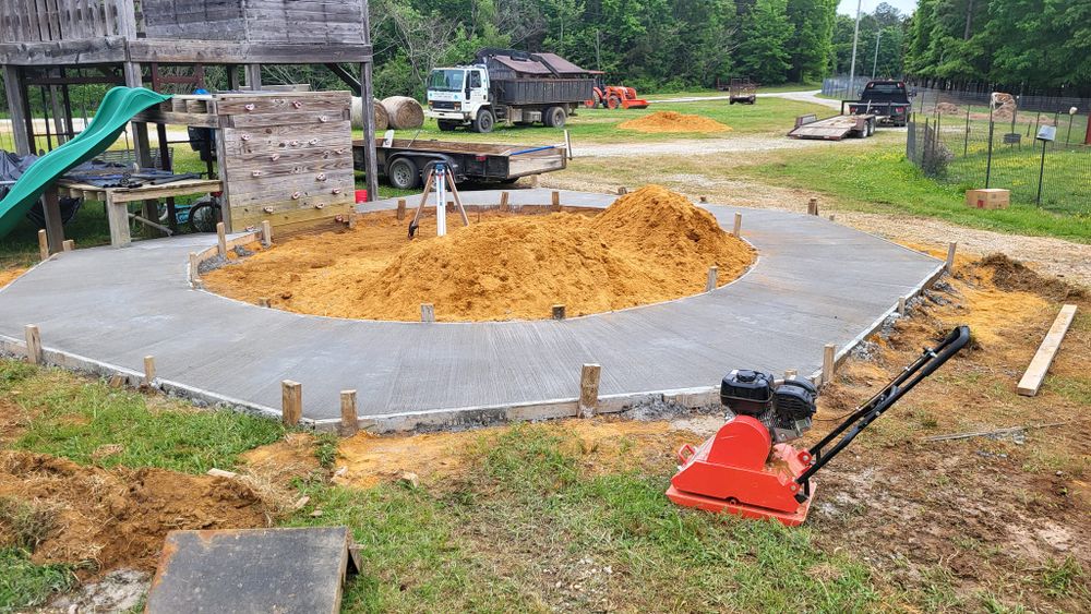 Transform your outdoor space with our expert Patio Design & Installation service. We specialize in creating durable, stylish concrete patios that enhance your home's beauty and provide lasting enjoyment for years to come. for Huerta's Concrete Finishing in Pontotoc, MS