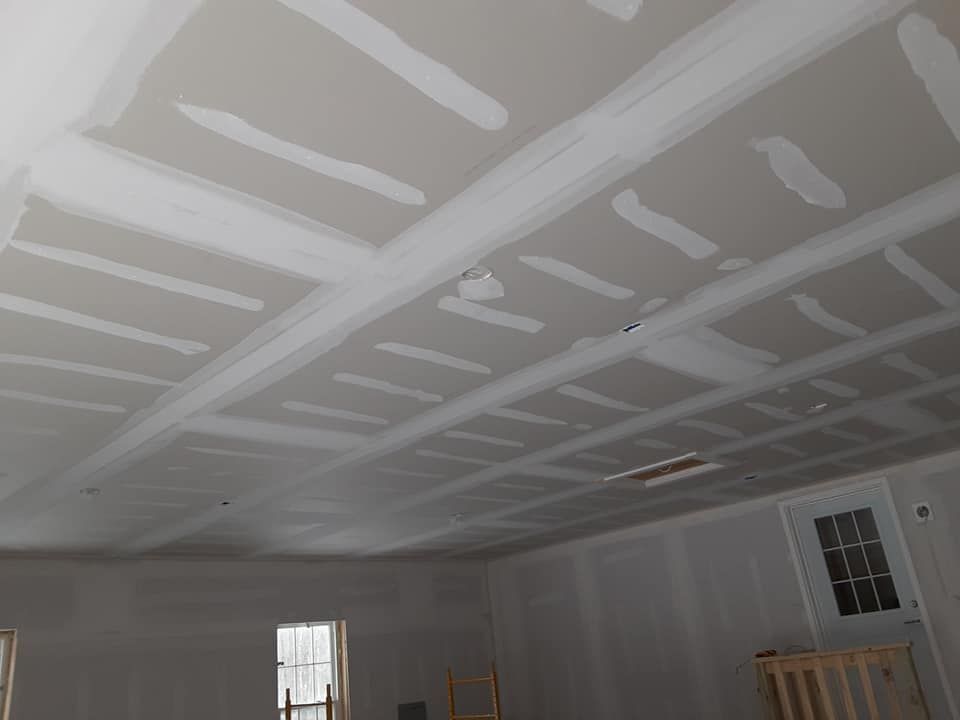 Enhance your home's interiors with our expert drywall finishing service, providing seamless surfaces through precise taping, mudding, and sanding for a flawless and polished look that stands the test of time. for Premier drywall in Springvale, ME