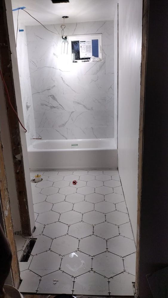 Transform your space with our expert bathroom renovation services. We combine innovative design, quality craftsmanship, and personalized attention to create a beautiful, functional bathroom tailored to your unique needs and style. for Moreira Construction in Lancaster, MA