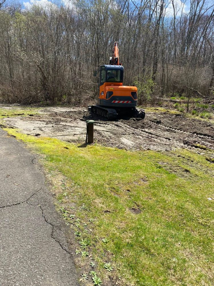 Our Site Preparation service ensures a smooth construction process by clearing debris, leveling the ground, and preparing your land for building. We create a solid foundation to support your project's success. for Davis Services LLC in Bethany, CT