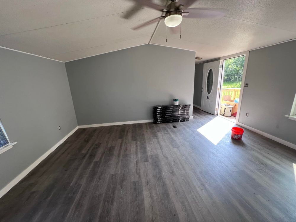 Our expert laminate flooring installation service transforms your home with durable, stylish options tailored to your needs, ensuring a flawless finish that enhances the beauty and functionality of any space. for Concord Builders in Lockhart, TX