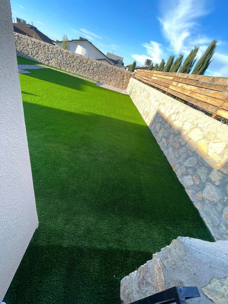 Our Turf Installation service offers homeowners a hassle-free and professional solution for transforming their outdoor space with lush, green grass that is both durable and low-maintenance. for Oasis Landscaping LLC  in El Paso, TX