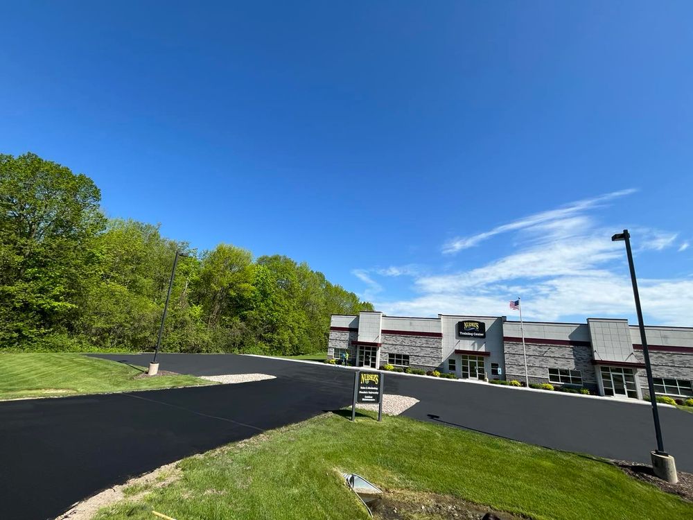 Roofing & Seal Coating for Davis Enterprises in Tomahawk, WI