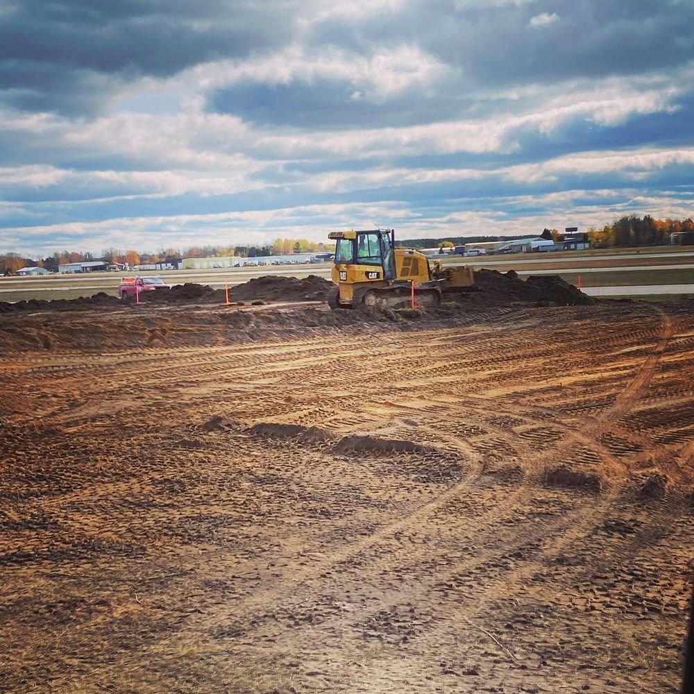 Our Building Site Prep service includes clearing, grading, and leveling the land to ensure a solid foundation for your new home construction. Trust us to prepare your site with expertise. for NC Dirt Works in Kingsley, MI