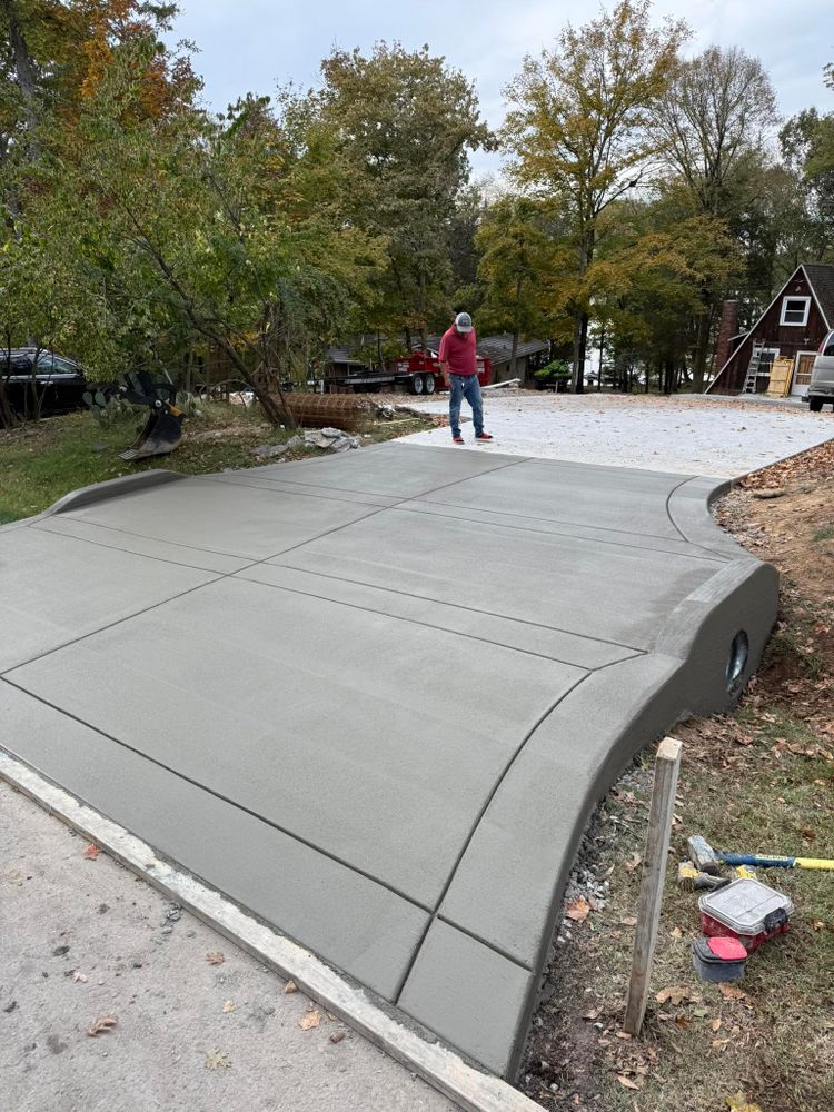 Enhance your home's curb appeal with our expert driveway construction service, specializing in durable concrete slab construction to ensure a long-lasting and aesthetically pleasing entrance for your property. for Tuck Concrete LLC in Hendersonville, TN