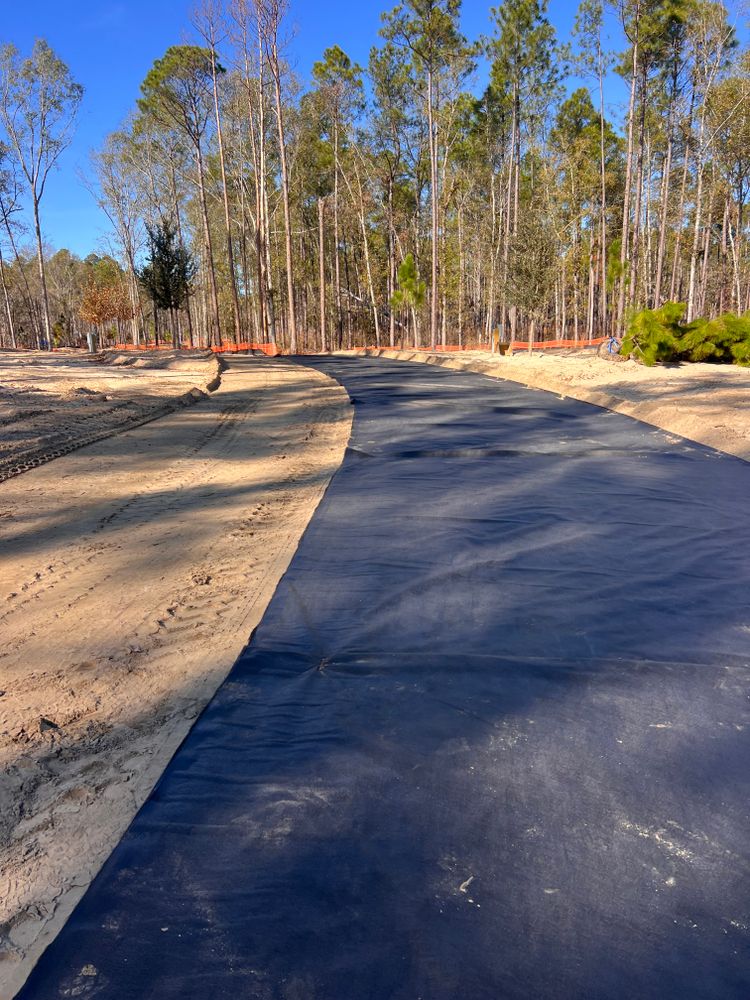 Our professional land and lot clearing service ensures a clean, safe foundation for your project by efficiently removing debris, trees, and unwanted vegetation while preserving the integrity of your property. for Coursey Construction in Metter, GA