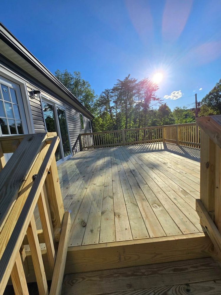 Enhance your outdoor living space with our expert deck and patio installation services, offering custom designs and quality craftsmanship to create a beautiful, durable area for relaxation and entertainment. for Deck It OUT Handyman & Remodeling in Clinton, TN