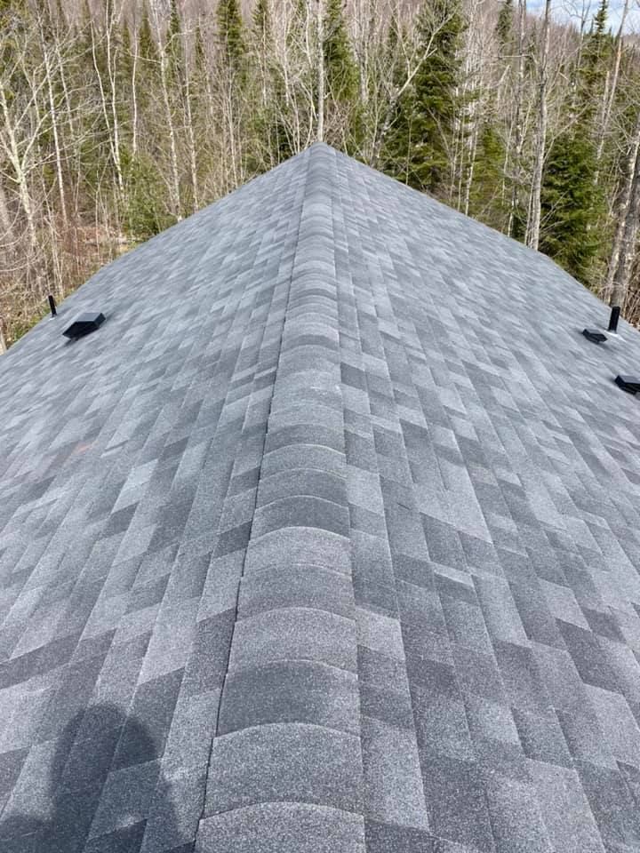 Our Shingle Roofing service ensures durable and aesthetic roofing solutions, specializing in efficient roofing repairs to enhance your home's protection while improving curb appeal with high-quality shingle materials. for LaFreniere Roofing in Grand Marais, MN