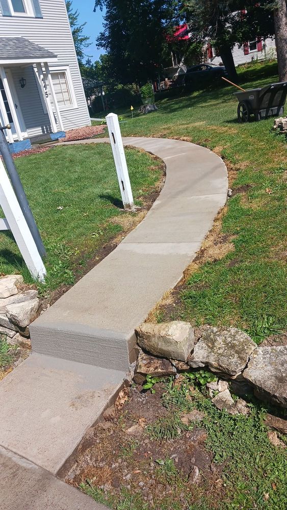 Our Sidewalk Installation service is perfect for homeowners looking to enhance the curb appeal of their property with a durable and attractive concrete walkway that will last for years to come. for Advanced Level Pro LLC in Hillsboro,  WI