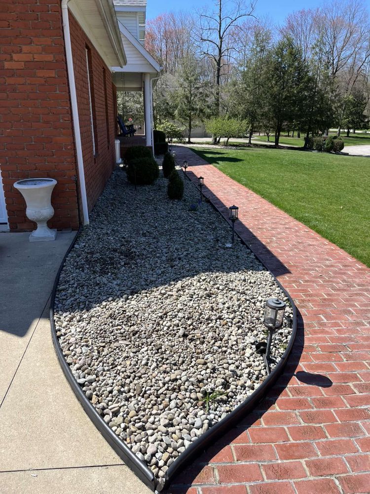 Enhance your garden with our professional mulch installation service, designed to enrich soil, retain moisture, and suppress weeds. Transform your landscape into a thriving oasis effortlessly with expert care and quality materials. for Wilt Landscaping in Greenville, PA