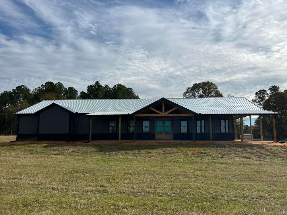 Our metal roofing service offers durable, weather-resistant solutions that enhance your home's curb appeal, providing exceptional protection and energy efficiency while ensuring long-lasting value for your investment. for J & J Specialties in Lexington , SC