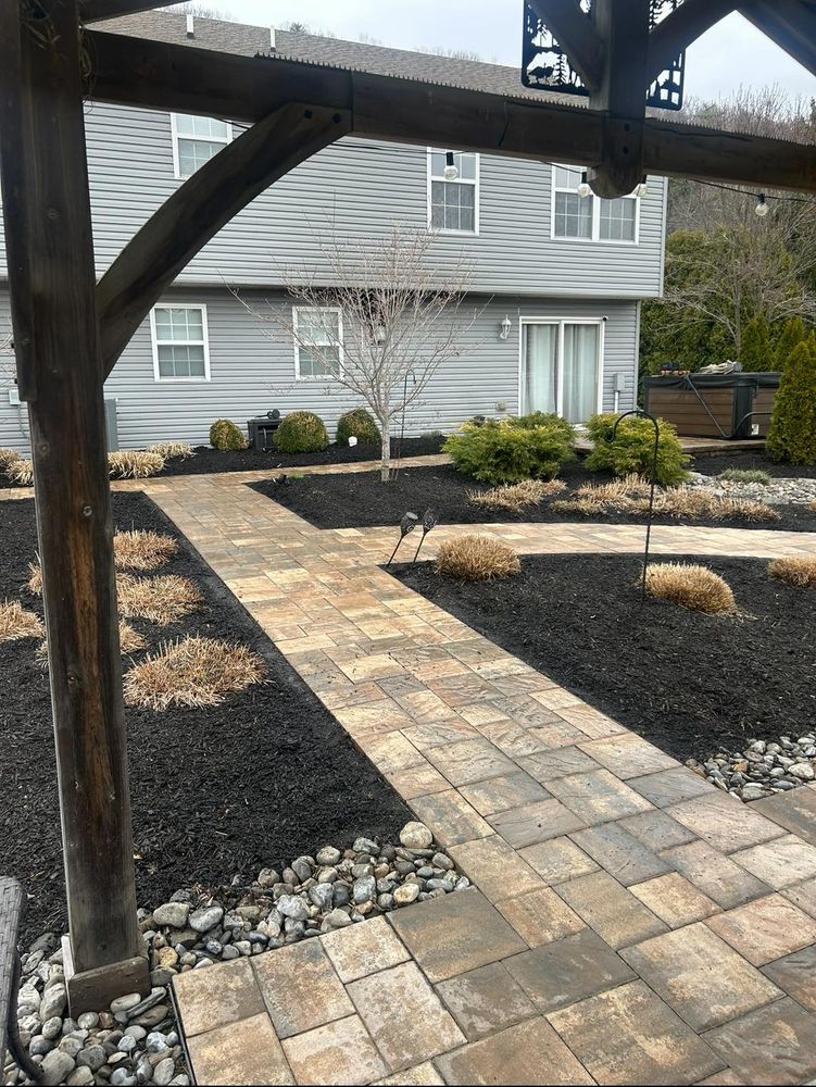 Enhance your garden's appearance and health with our professional mulch installation service. We efficiently spread high-quality mulch, conserving moisture, reducing weeds, and adding an attractive finish to your landscaping project. for K Enterprises in Tamaqua, PA