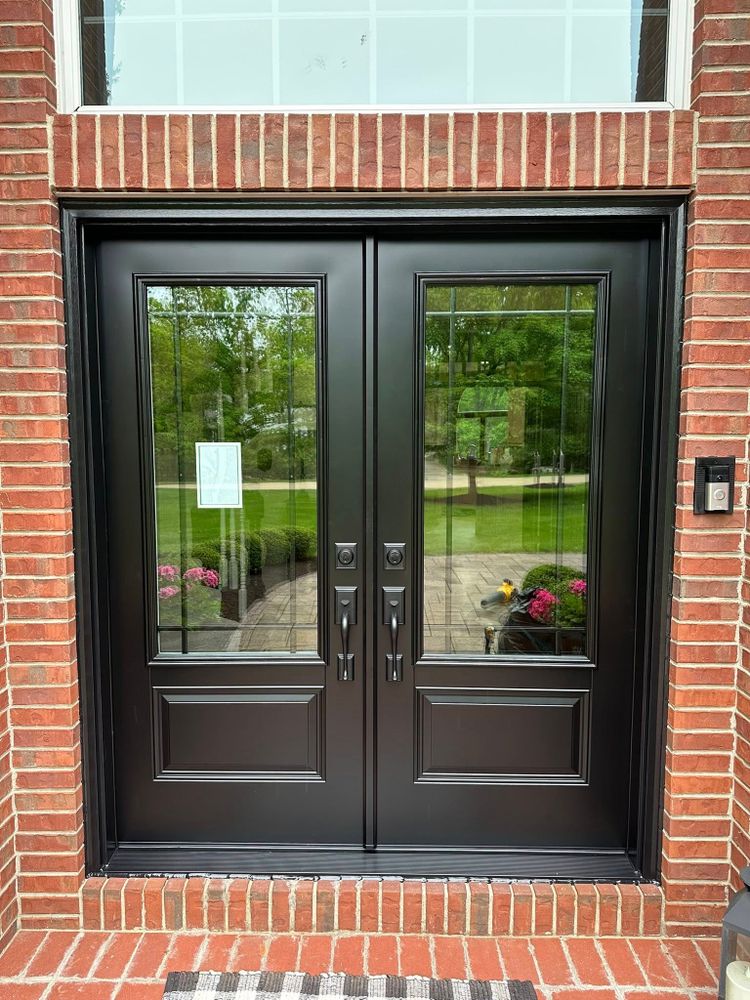Enhance your home's exterior with our professional door installation service, expertly coordinated with deck & patio installation to ensure seamless integration for a stunning and functional outdoor living space. for Draft Door Pro's in Amherst, OH