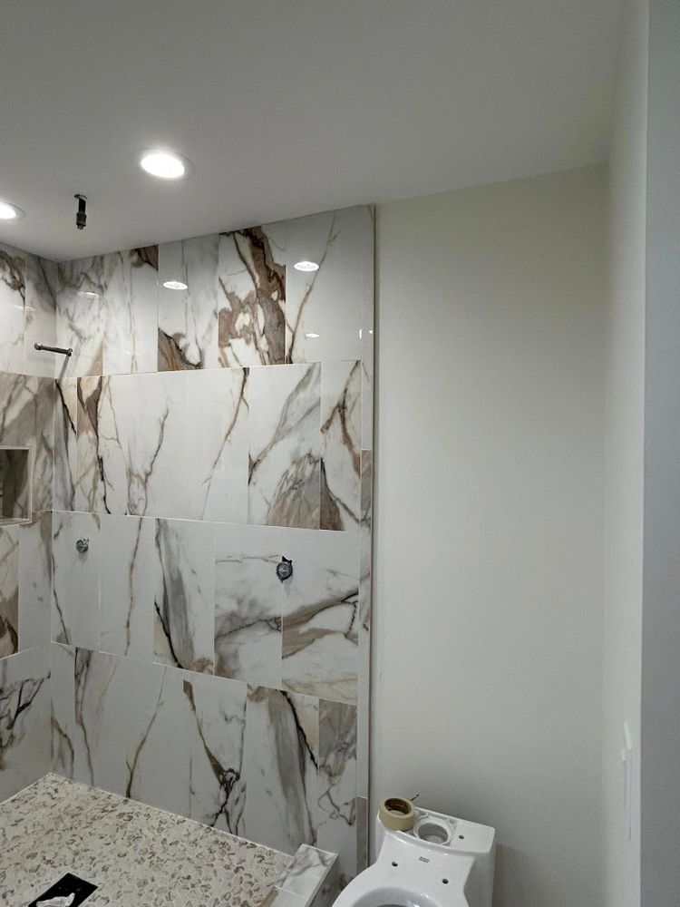 Transform your home with our expert tiling service, offering precise installation and a wide selection of stylish tiles to enhance any room's aesthetic while ensuring durability and long-lasting appeal. for Third Generation Construction in Porter, TX