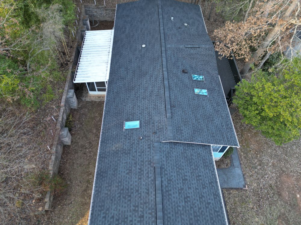 Our expert roofing services specialize in metal roofing, providing homeowners with durable, energy-efficient solutions that enhance your property's protection and aesthetic appeal while ensuring long-lasting performance and value. for JV Painting Services LLC in Hendersonville, NC