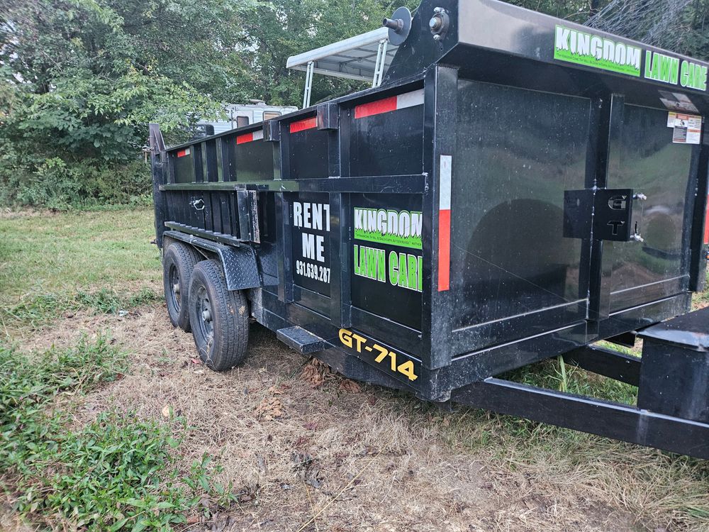 Our Dumpster Rental and Junk Removal service complements your lawn care needs by efficiently handling debris, including stump tree removal, ensuring a clean and pristine outdoor space for your home. for Kingdom Lawn Care  in Shelbyville, TN