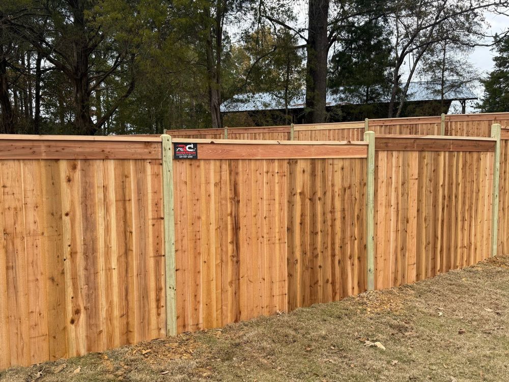 Enhance your property's charm and security with our expert Wood & Farm Fences service, featuring durable materials and skilled craftsmanship to beautifully complement landscapes while providing reliable boundary solutions. for Roberson Construction in Jackson, MS