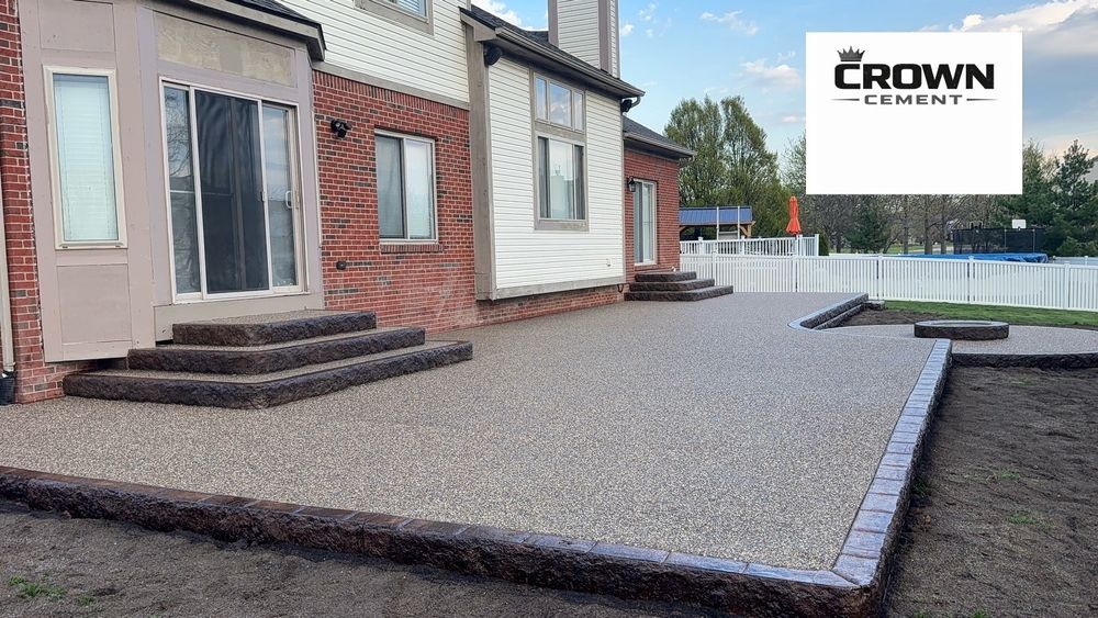 Patios across Canton, Plymouth, Livonia, Novi, Wyandotte, and Southeast Michigan, including Broom Finish, Stamped Concrete, and Exposed Aggregate options. for Crown Cement in Canton Township, MI
