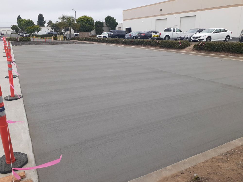 Our Commercial Concrete Paving Services offer our clients professional paving solutions for driveways and parking areas, providing durable surfaces that enhance curb appeal and increase property value. for Indy Elite Concrete in Arcadia, IN