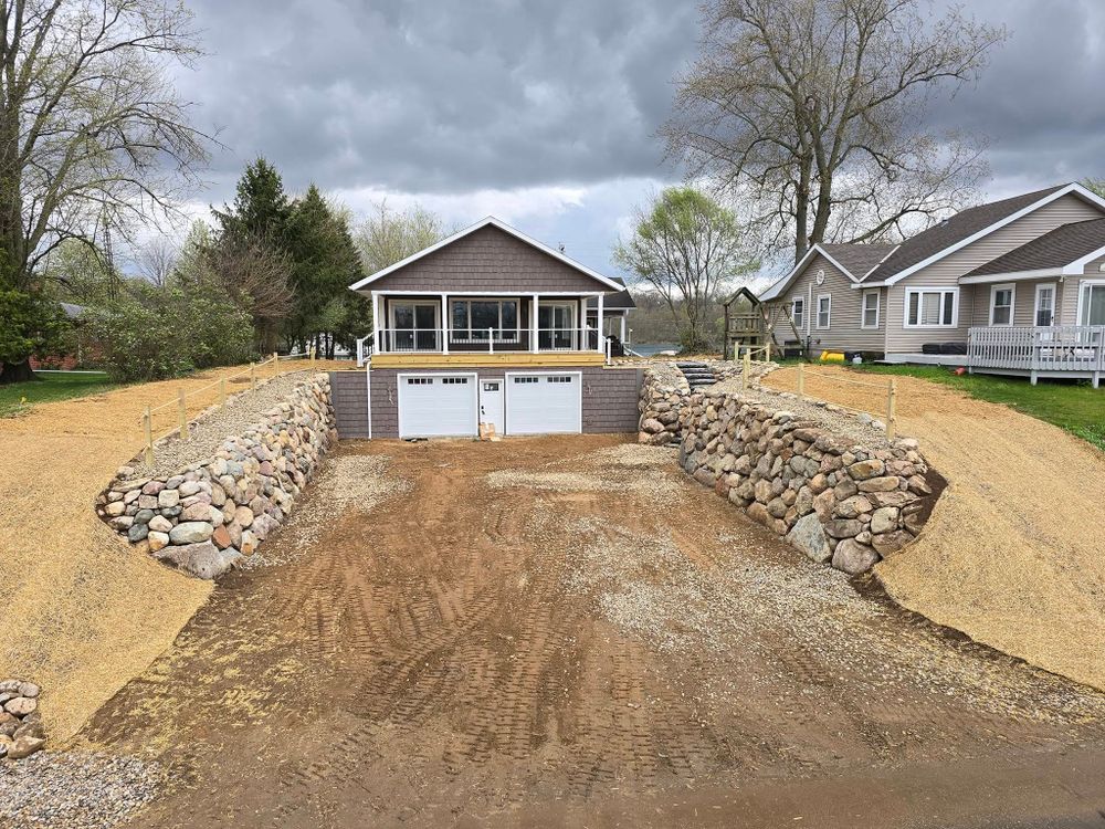 Enhance your home's curb appeal with our expert boulder placement services, creating natural beauty and structure in your landscape. Our team carefully selects and installs boulders to complement any outdoor space. for Michiana Boulders Landscaping & Excavating in Union, MI