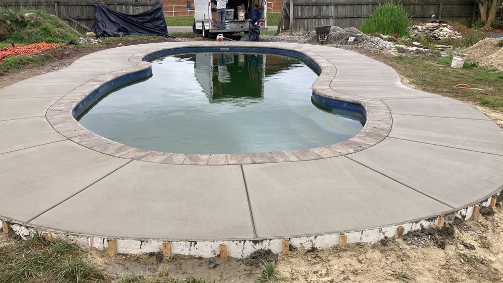 Transform your outdoor space with our expert Patio Design & Installation service, offering customized solutions, durable materials, and professional craftsmanship to create the perfect patio for relaxation and entertainment. for RGM Concrete Finisher LLC in Chesapeake, VA