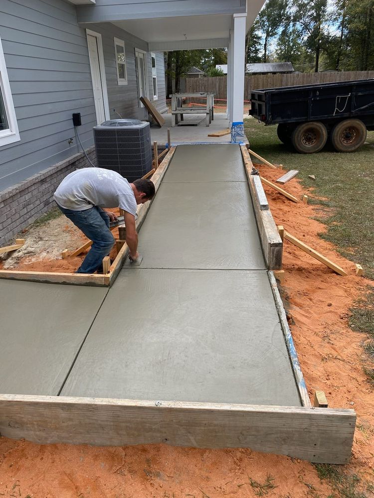 Enhance your property with our professional sidewalk construction services, specializing in durable and aesthetically pleasing concrete slab construction, ensuring safe walkways that boost curb appeal and withstand the elements. for Southern Boys Concrete LLC in   Hosford, FL