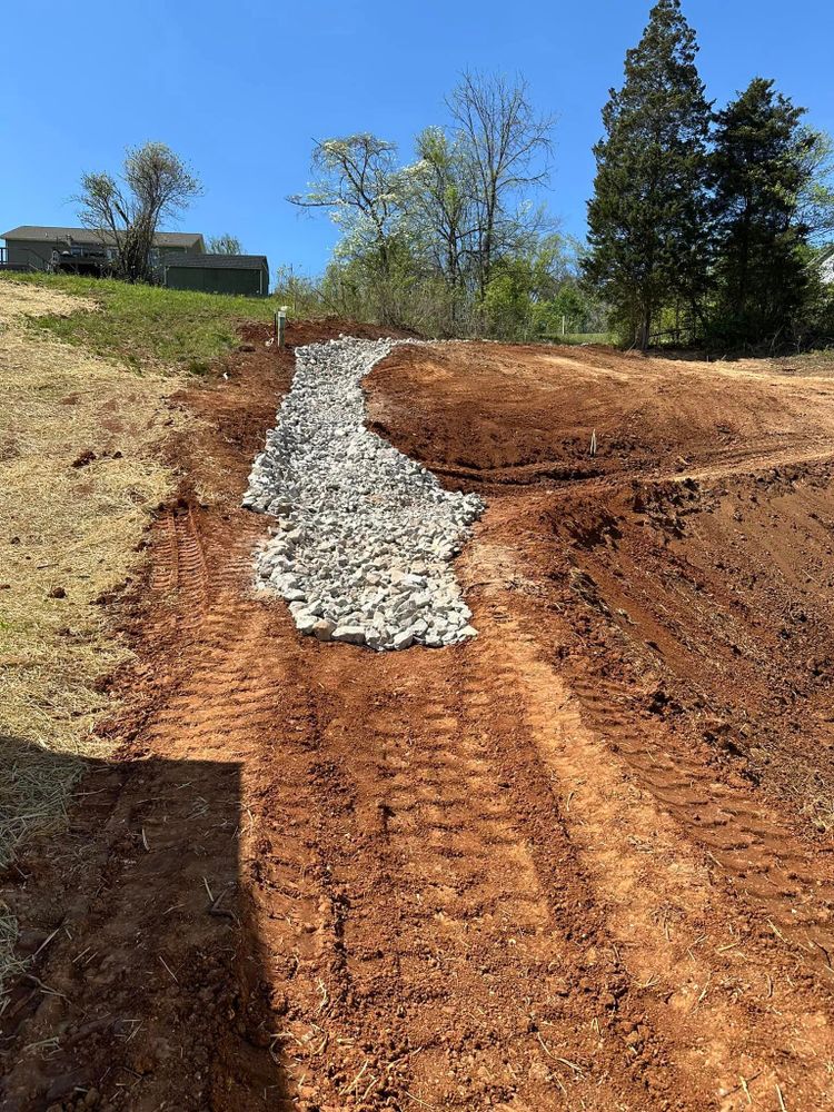 Our drainage service helps prevent water damage to your property by efficiently removing excess water and directing it away from your home, keeping your land clear and free of standing water. for Wilson Quality Construction  in New Tazewell, TN