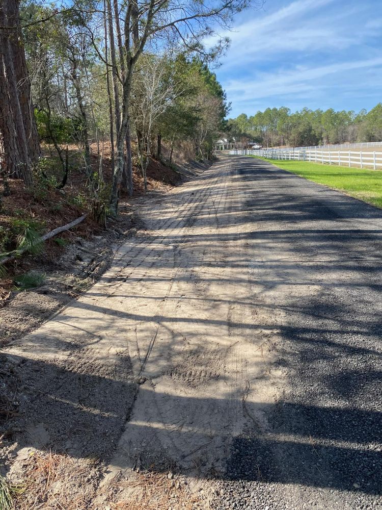 Our grading service helps ensure a level and stable foundation for your landscaping projects, minimizing potential drainage issues and promoting healthy plant growth. Trust us to transform your outdoor space. for Southeast Aquatic Land Services LLC  in Waycross, GA