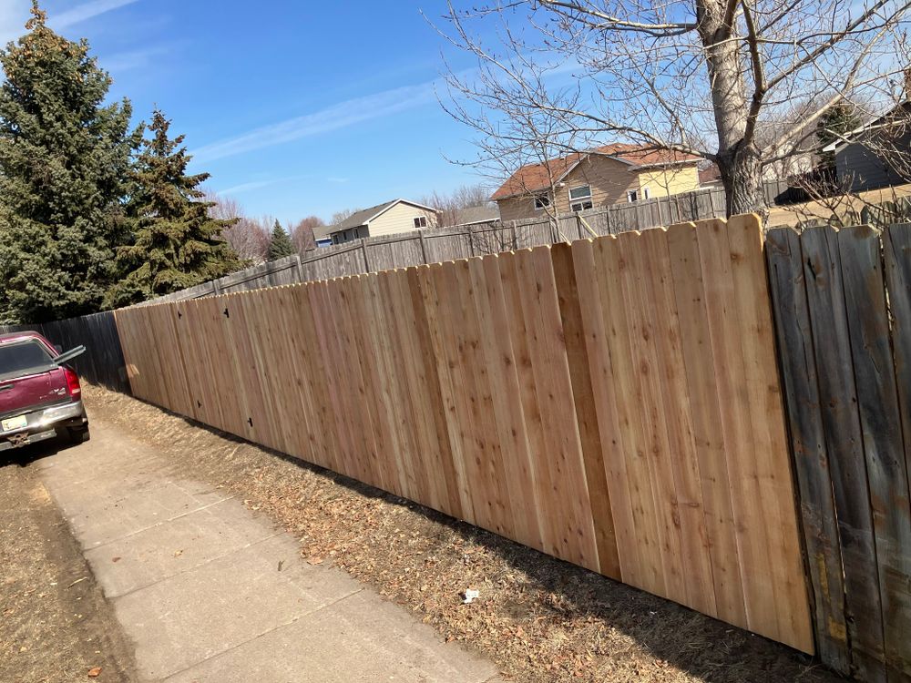 Our Custom Fence Design service creates a fence tailored to your home, style, and needs, blending expert craftsmanship with durable materials to deliver privacy, security, beauty, and long-lasting value. for Nelson Family Fence in Maplewood, MN