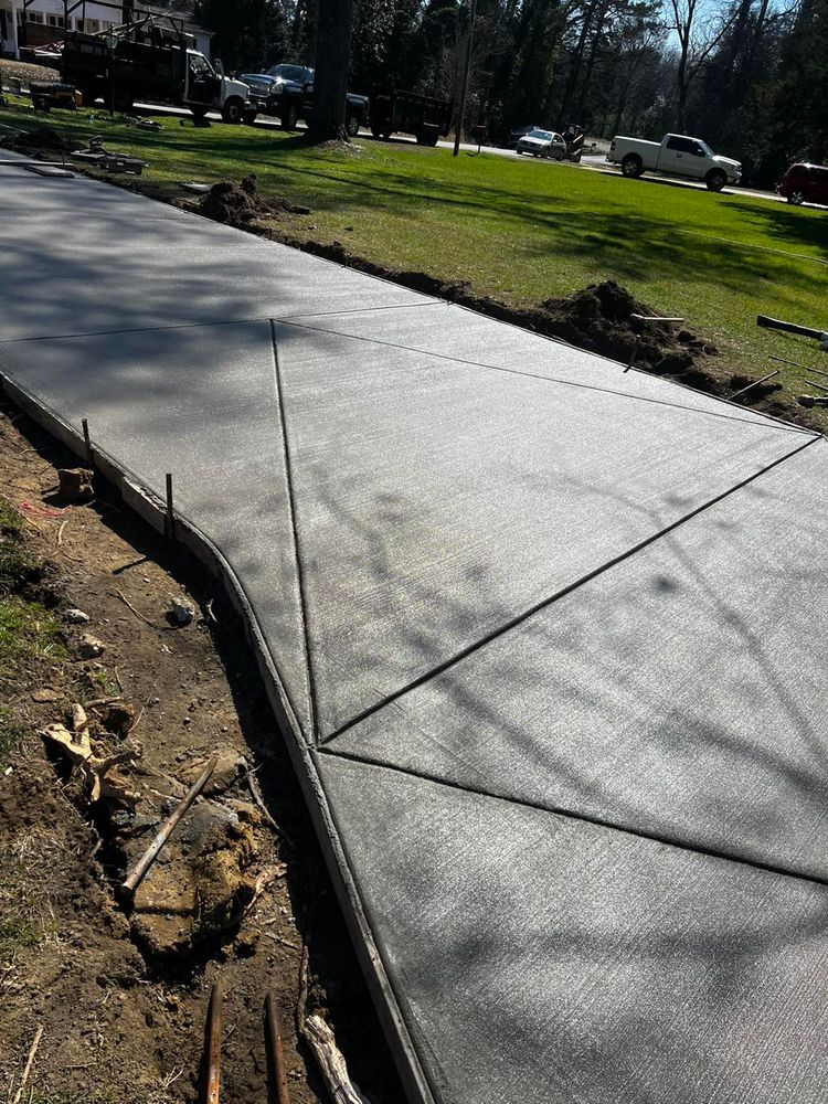 Enhance your home's appeal and safety with our expert sidewalk installation service. We offer durable, weather-resistant concrete sidewalks tailored to fit your property’s unique style and functional needs. for Allen's Concrete Finishing in Rock Hill, SC