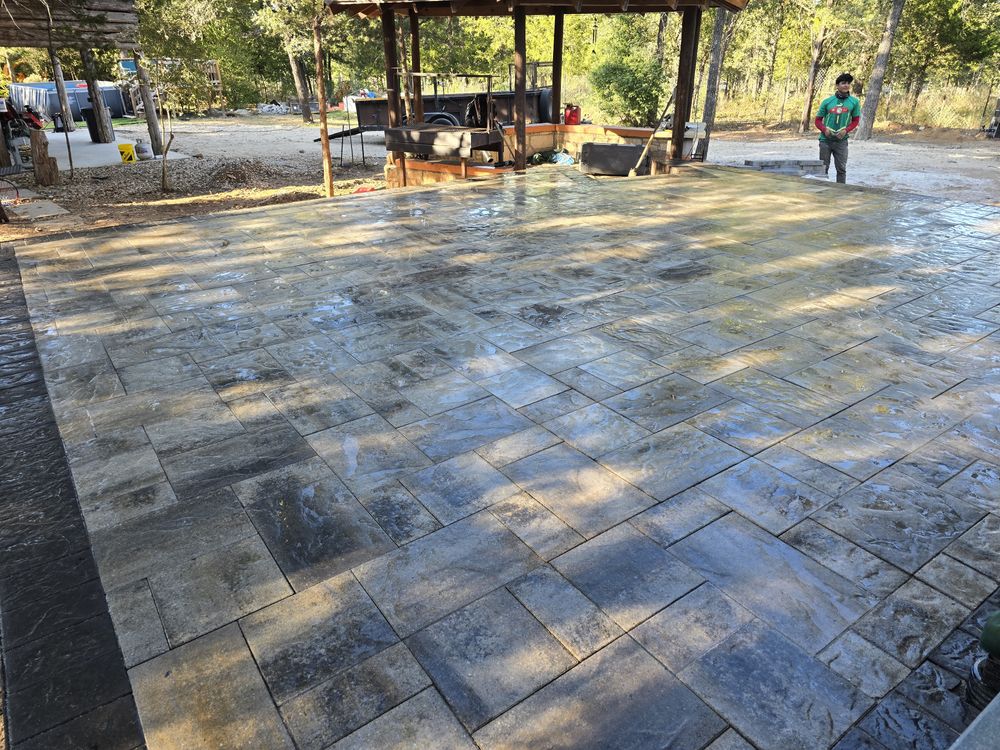 Enhance your home's outdoor space with our expert concrete, natural stone, and brick pavers service, providing durable and stylish solutions that transform patios, driveways, and walkways into beautiful areas for relaxation and enjoyment. for Green Pastures Lawn Care in Bastrop, TX
