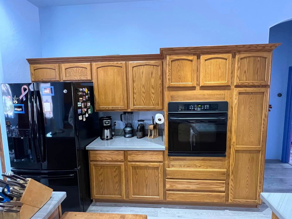 Our Kitchen and Cabinet Refinishing service offers homeowners a cost-effective solution to enhance the aesthetic appeal of their kitchen by giving cabinets a fresh, modern look. for Reed's Painting LLC in Prescott Vallley, AZ