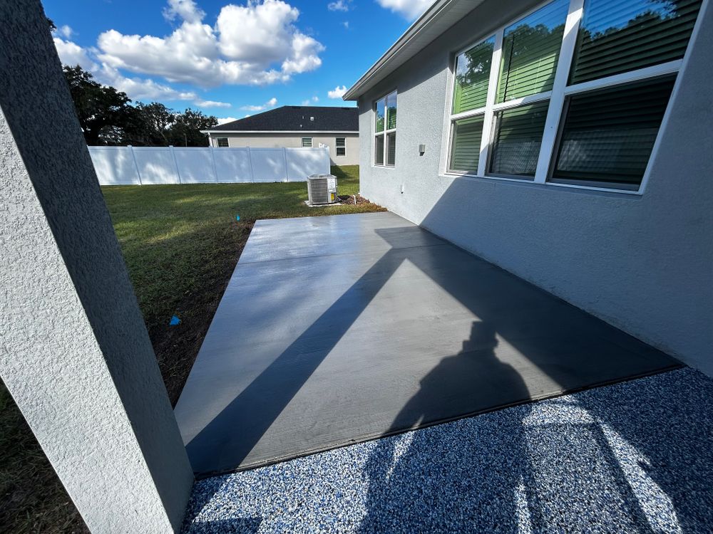 Enhance your outdoor living space with our expert patio design and installation service. Our skilled team crafts durable, stylish concrete patios tailored to complement your home's aesthetic and lifestyle. for Cornerstone Concrete Solutions LLC in Lakeland, FL