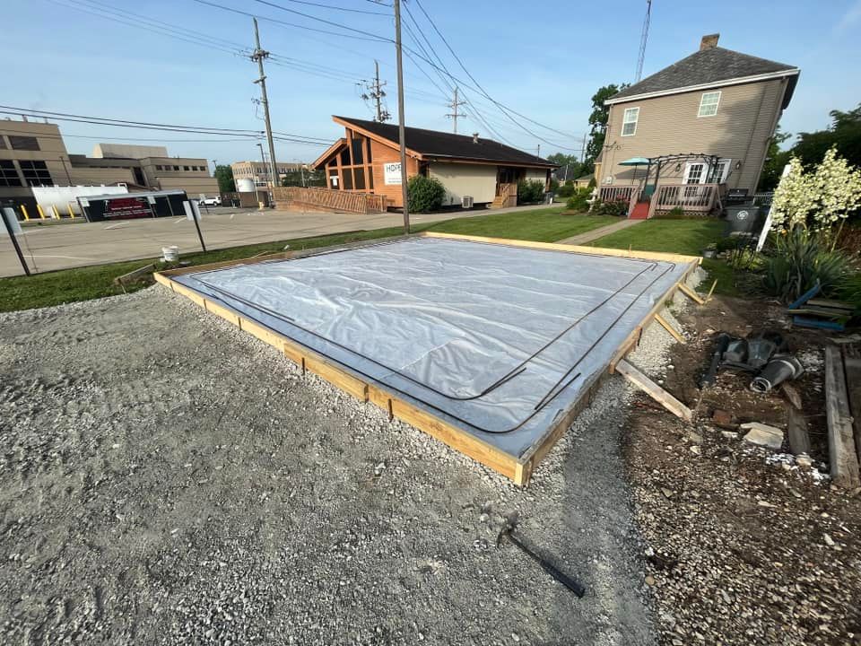 Our Concrete Prep service ensures a solid foundation by expertly leveling, grading, and compacting the site. This prepares the area for smooth concrete installation, enhancing durability and longevity in your home projects. for KW Earthworks in Connersville, IN