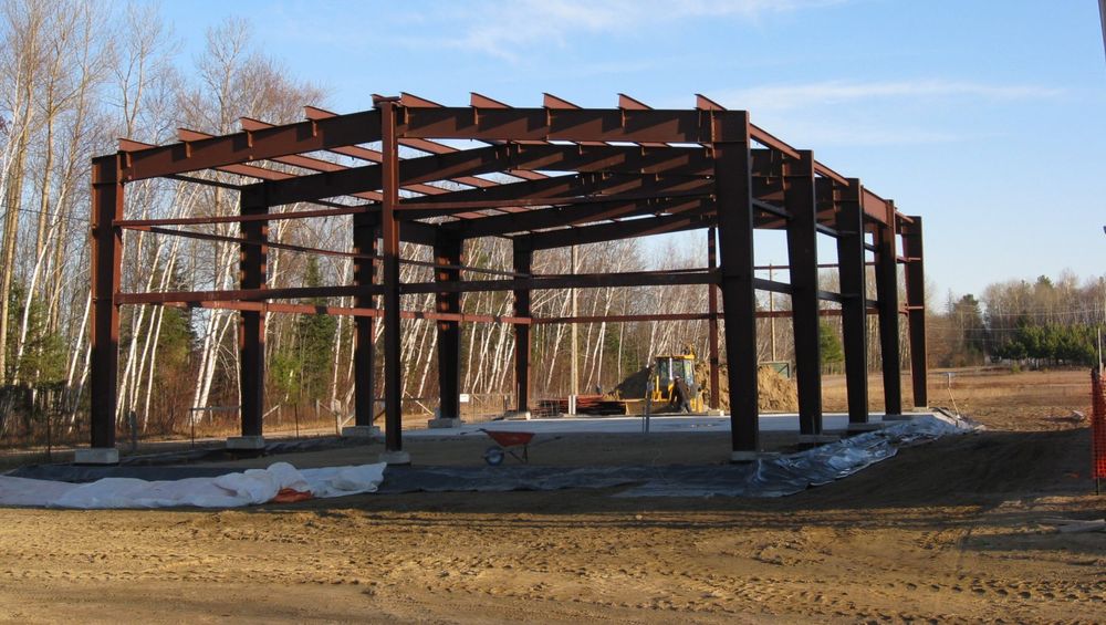 Our Steel service offers durable and versatile structural solutions for your new construction project. From beams to frames, trust our expert team to deliver top-quality steel products and installation services. for Kiker Construction & Development in Ball Ground, GA