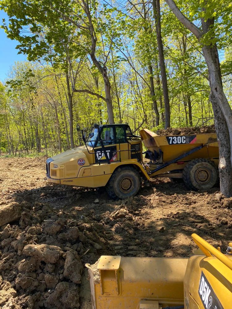 Our Land Grading service ensures a stable foundation by leveling your property, preventing drainage issues, and preparing the site for seamless construction or landscaping to enhance safety and aesthetics. for Home Perfection in Brick Township, NJ