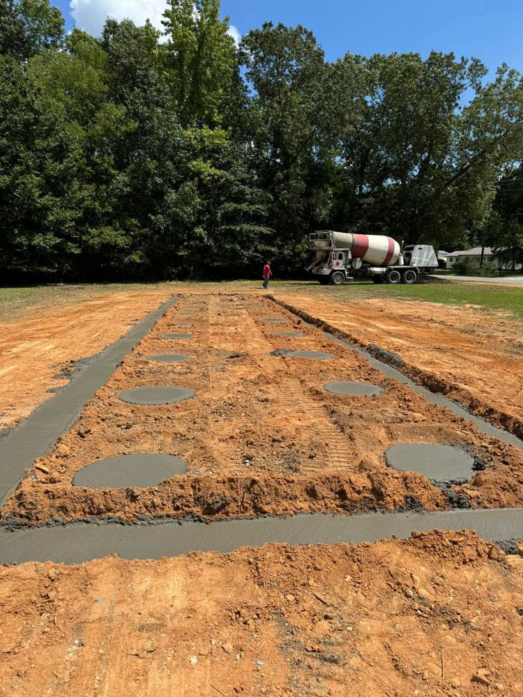 Our Foundation Digging service provides precise and reliable excavation solutions to ensure a solid base for your home projects, combining skilled expertise with state-of-the-art equipment for dependable results. for West TN Dirt Works in Lexington, TN