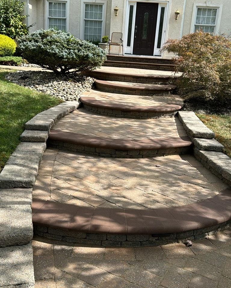 Our Hardscape Installation service transforms your outdoor space with durable and aesthetically pleasing elements like patios, walkways, and retaining walls, enhancing functionality and adding value to your home. for J&J Martinez Landscaping in Burlington County, NJ
